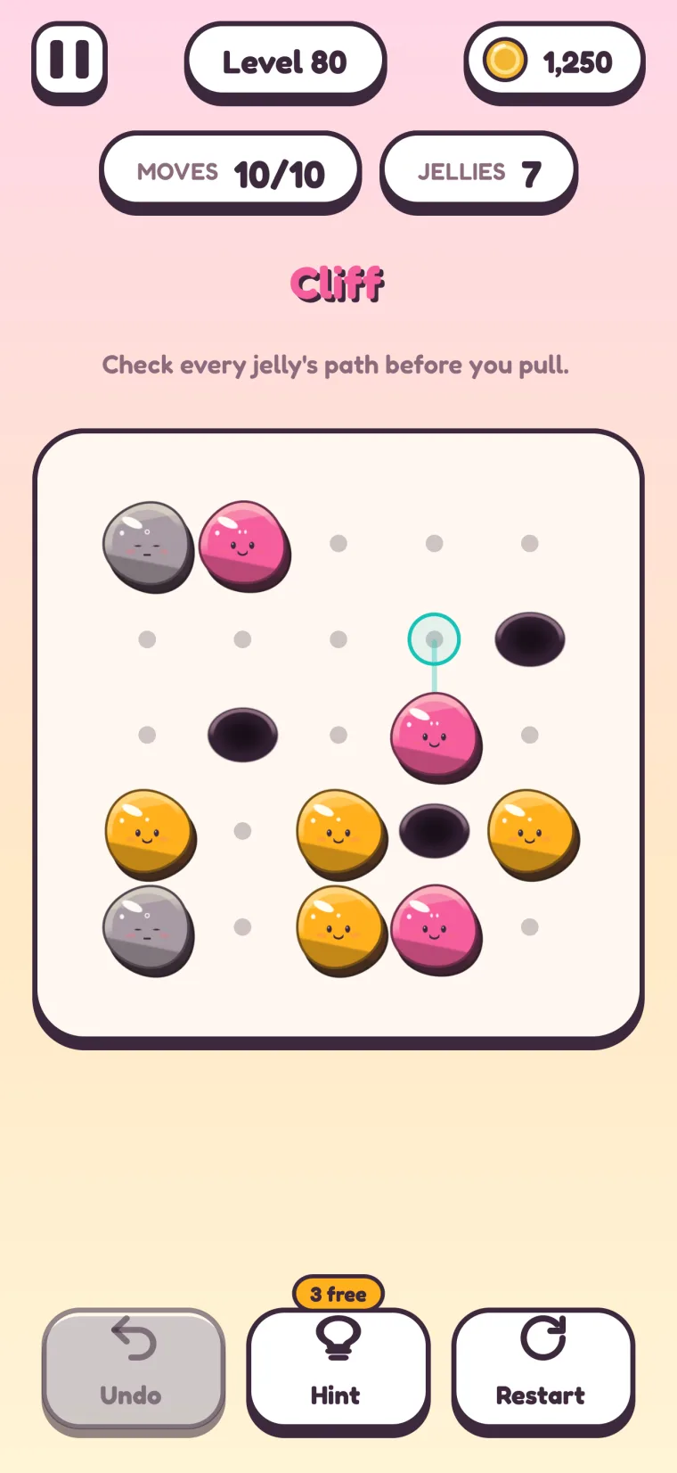 Level 80, Cliff: three black holes on a 5×5 board, with gray, pink and orange jellies around them and a pull point armed above a pink jelly.